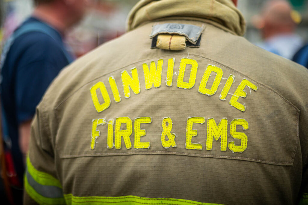 Dinwiddie County Fire & EMS stitched reflectors on the back of a turnout jacket